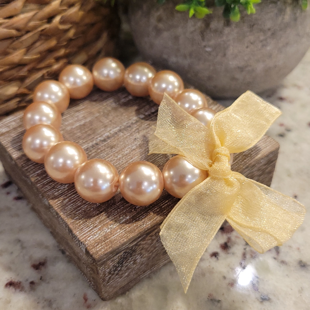 Pearl Bead Bracelet with Gold Bow